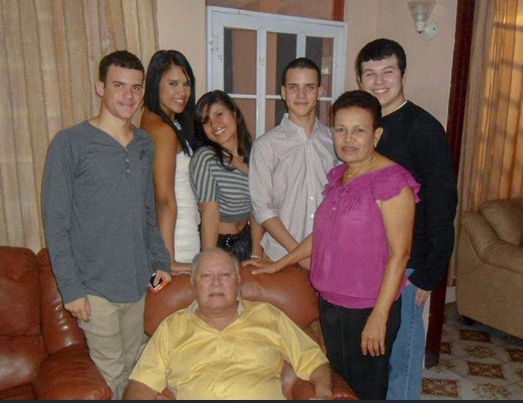 Trystan Colon-Castillo stands with his cousins and his dad’s parents
